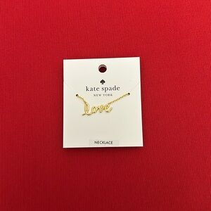 New (NWT) Kate Spade gold Love necklace. Adjustable chain - 7 inch to 10 inch.